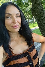 Ukrainian mail order bride Iryna from Kyiv with black hair and green eye color - image 8
