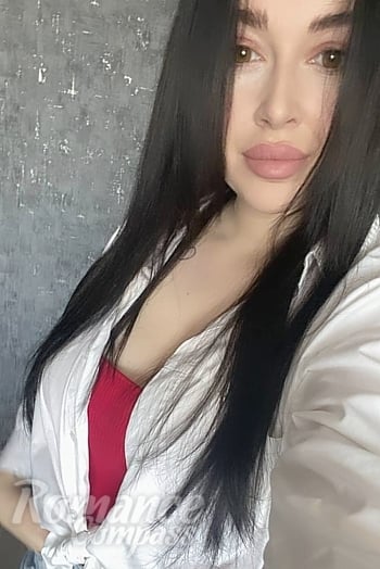 Ukrainian mail order bride Anna from Odesa with black hair and brown eye color - image 1