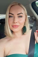 Ukrainian mail order bride Yuliia from Kyiv with blonde hair and green eye color - image 5