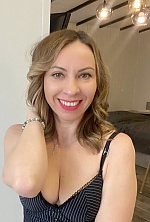 Ukrainian mail order bride Natalia from Kamianets-Podilskyi with light brown hair and green eye color - image 8