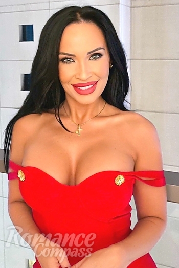 Ukrainian mail order bride Marina from Dubai with black hair and blue eye color - image 1