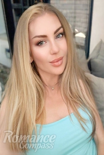 Ukrainian mail order bride Marina from Velbert with blonde hair and green eye color - image 1