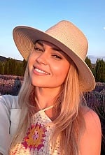 Ukrainian mail order bride Oksana from Costești with blonde hair and hazel eye color - image 7