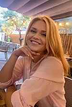 Ukrainian mail order bride Oksana from Costești with blonde hair and hazel eye color - image 8