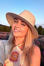 Ukrainian mail order bride Oksana from Costești with blonde hair and hazel eye color - image 2