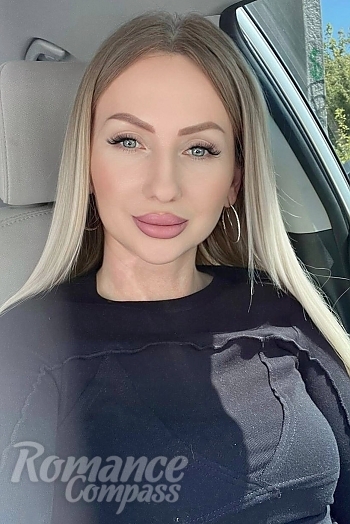 Ukrainian mail order bride Natalia from Ivano-Frankivsk with blonde hair and blue eye color - image 1