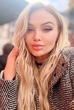 Ukrainian mail order bride Olena from Kyiv with blonde hair and brown eye color - image 8