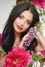Ukrainian mail order bride Irena from Odesa with black hair and green eye color - image 4