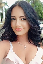 Ukrainian mail order bride Irena from Odesa with black hair and green eye color - image 3