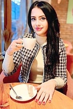 Ukrainian mail order bride Irena from Odesa with black hair and green eye color - image 5