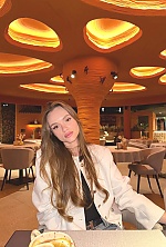 Ukrainian mail order bride Xenia from Kyiv with brunette hair and green eye color - image 2