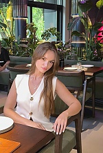 Ukrainian mail order bride Xenia from Kyiv with brunette hair and green eye color - image 6