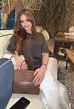 Ukrainian mail order bride Xenia from Kyiv with brunette hair and green eye color - image 8