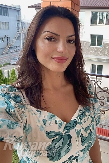 Ukrainian mail order bride Galina from Kyiv with auburn hair and hazel eye color - image 1