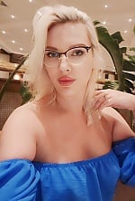 Ukrainian mail order bride Nataliia from Kropyvnytskyi with blonde hair and green eye color - image 3