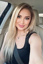 Ukrainian mail order bride Ganna from Kyiv with blonde hair and green eye color - image 3