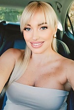 Ukrainian mail order bride Viktoriia from Dnipro with blonde hair and grey eye color - image 3
