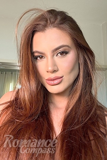 Ukrainian mail order bride Tais from Rio de Janeiro with light brown hair and brown eye color - image 1