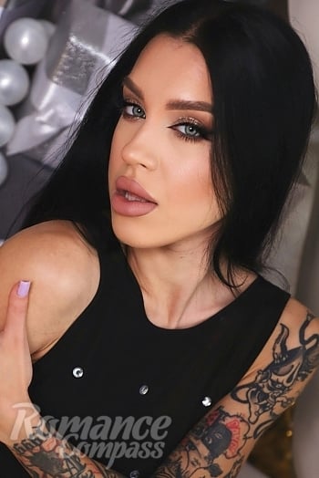 Ukrainian mail order bride Irina from Odesa with black hair and blue eye color - image 1