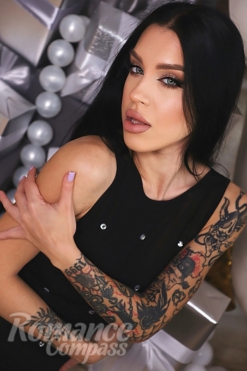 Ukrainian mail order bride Irina from Odesa with black hair and blue eye color - image 1