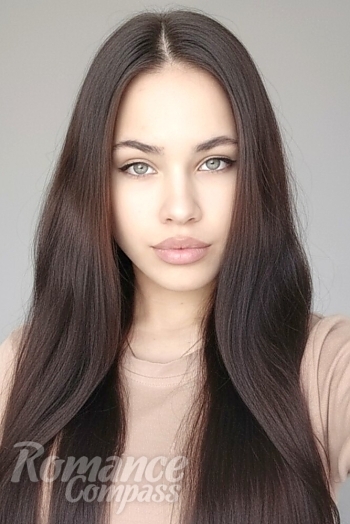 Ukrainian mail order bride Ilona from Kyiv with brunette hair and green eye color - image 1