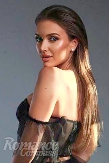 Ukrainian mail order bride Karina from Odesa with light brown hair and green eye color - image 1