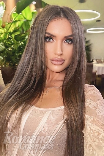 Ukrainian mail order bride Karina from Odesa with light brown hair and green eye color - image 1