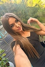 Ukrainian mail order bride Karina from Odesa with light brown hair and green eye color - image 7