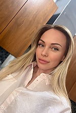 Ukrainian mail order bride Olga from Leipzig with blonde hair and blue eye color - image 12