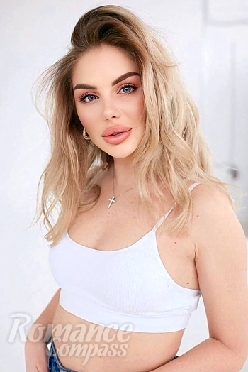 Ukrainian mail order bride Olha from Lviv with blonde hair and blue eye color - image 1