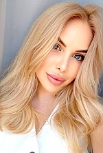 Ukrainian mail order bride Olha from Lviv with blonde hair and blue eye color - image 7