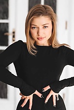 Ukrainian mail order bride Tetiana from Lviv with blonde hair and blue eye color - image 31