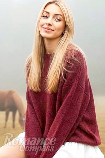 Ukrainian mail order bride Natalia from Warsaw with blonde hair and blue eye color - image 1