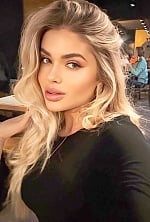Ukrainian mail order bride Alina from Kyiv with blonde hair and green eye color - image 3