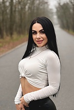 Ukrainian mail order bride Olga from Zaporizhzhya with black hair and green eye color - image 14