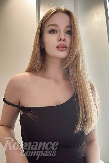 Ukrainian mail order bride Irina from Kyiv with blonde hair and green eye color - image 1