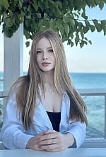 Ukrainian mail order bride Iryna from Kyiv with blonde hair and green eye color - image 2