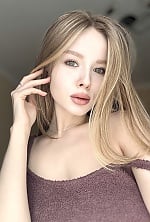 Ukrainian mail order bride Iryna from Kyiv with blonde hair and green eye color - image 9