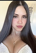 Ukrainian mail order bride Denisse from Santiago with black hair and brown eye color - image 6