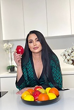 Ukrainian mail order bride Julia from Kyiv with brunette hair and brown eye color - image 24