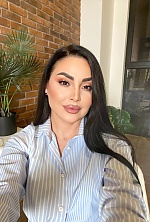 Ukrainian mail order bride Julia from Kyiv with brunette hair and brown eye color - image 11