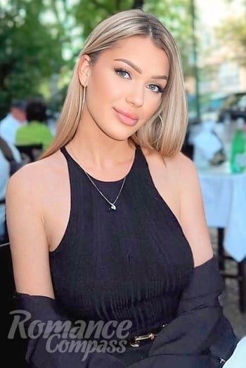 Ukrainian mail order bride Yana from Berlin with blonde hair and blue eye color - image 1