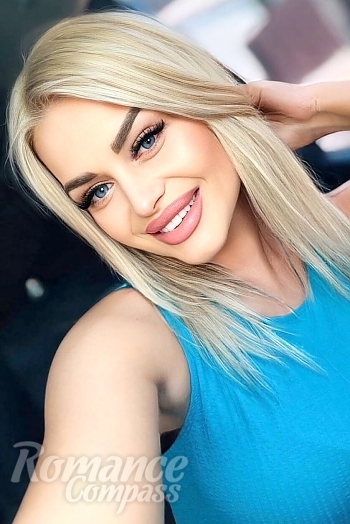 Ukrainian mail order bride Diana from Kyiv with blonde hair and blue eye color - image 1