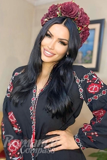 Ukrainian mail order bride Viktoria from Kyiv with black hair and hazel eye color - image 1