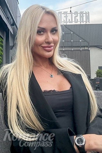 Ukrainian mail order bride Katerina from Dnipro with blonde hair and green eye color - image 1