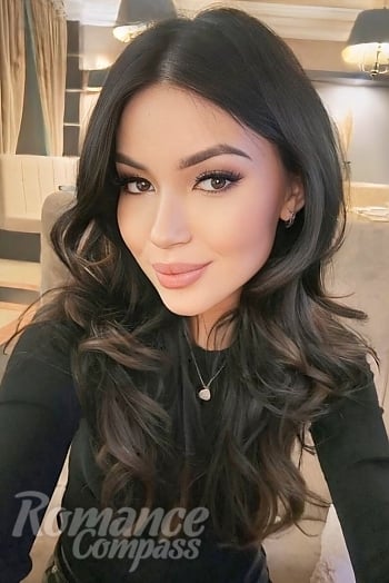 Ukrainian mail order bride Inkar from Kyiv with black hair and hazel eye color - image 1