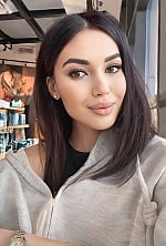 Ukrainian mail order bride Inkar from Kyiv with black hair and hazel eye color - image 6