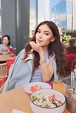 Ukrainian mail order bride Inkar from Kyiv with black hair and hazel eye color - image 2