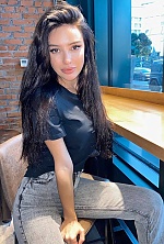 Ukrainian mail order bride Oleksandra from Kyiv with black hair and green eye color - image 9