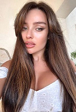 Ukrainian mail order bride Oleksandra from Kyiv with black hair and green eye color - image 11